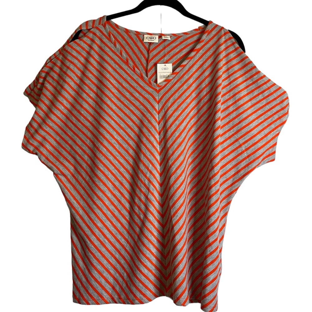 Cute Top with peek a boo cold shoulder sleeves.